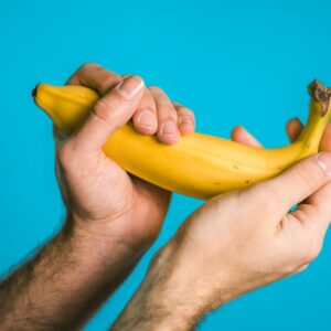 person holding banana